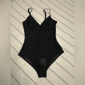Black Shapewear with Textured Panel and V-Neckline